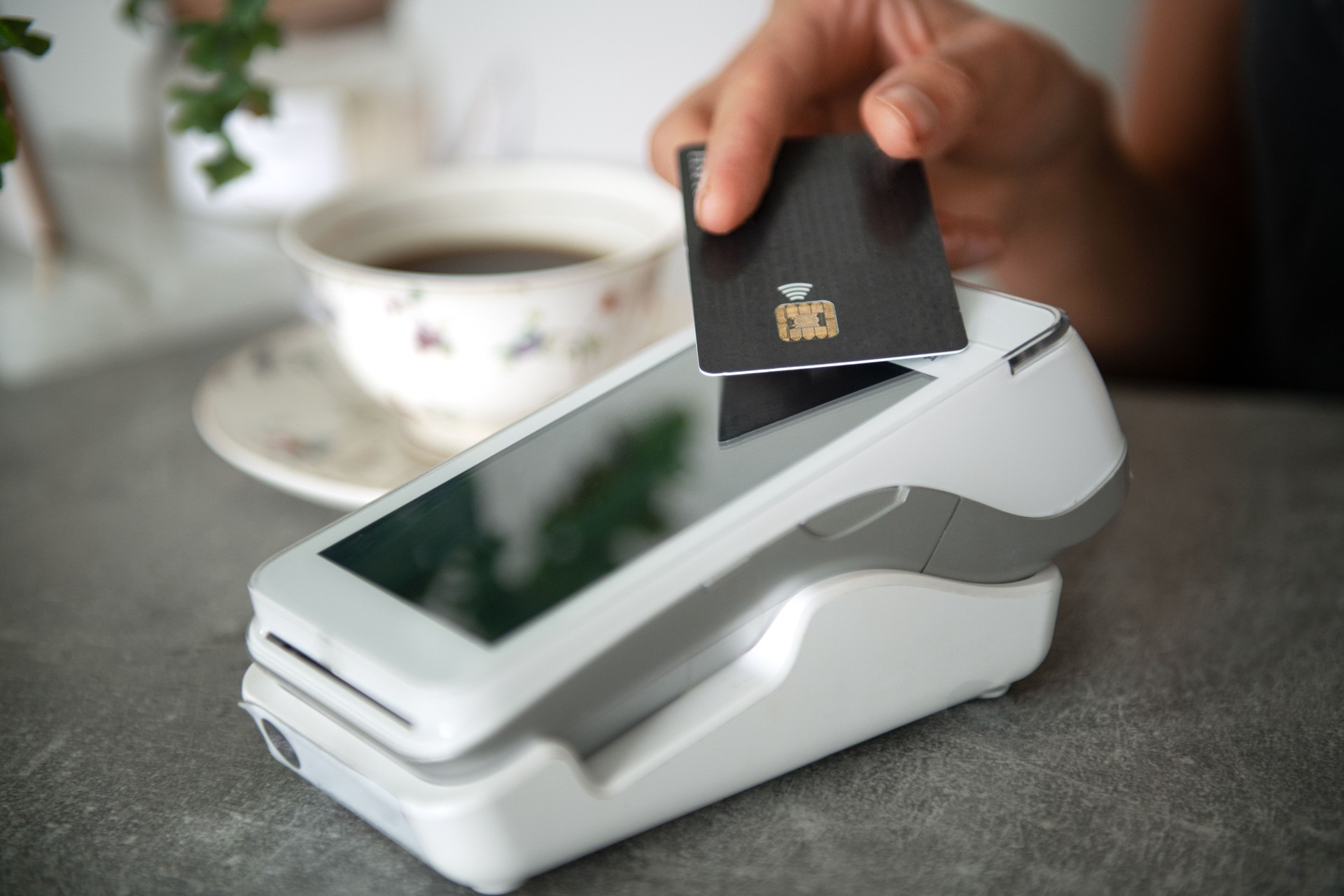 contactless payment by credit card and POS terminal